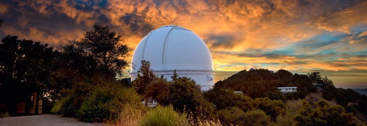 Photo of UCO Lick telescope at sunset by Willie Martini for UCO Lick.