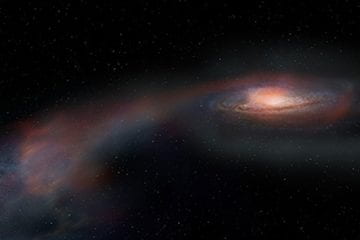 Astronomers witness star-slinging tug-of-war between merging galaxies